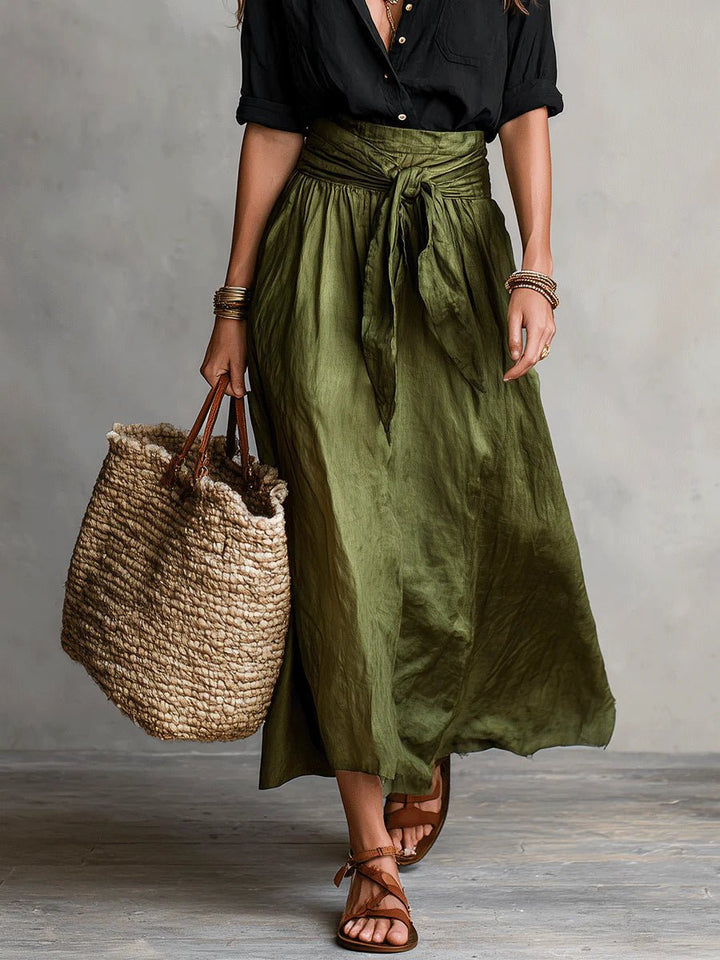 Stylish green women's two-piece set: button-front top & tie-waist maxi skirt. Perfect for summer and vacation.