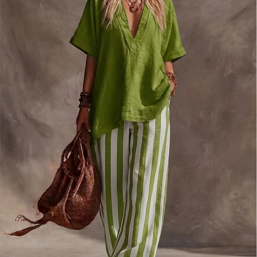 Yellow striped wide-leg pants & V-neck top set. Trendy women's bohemian style, ideal for summer outfits.