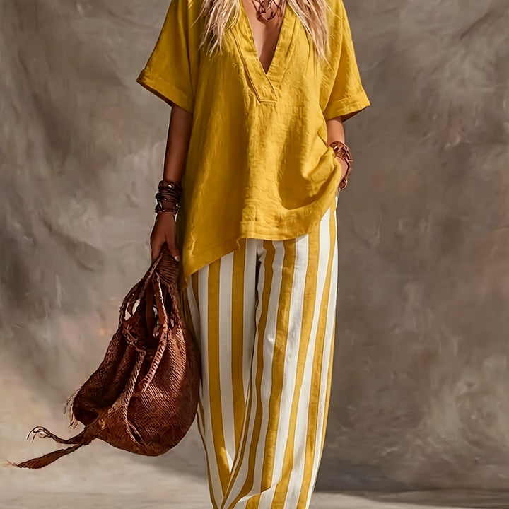 Women's green striped wide-leg pants and V-neck top set. Effortless matching two-piece casual wear.