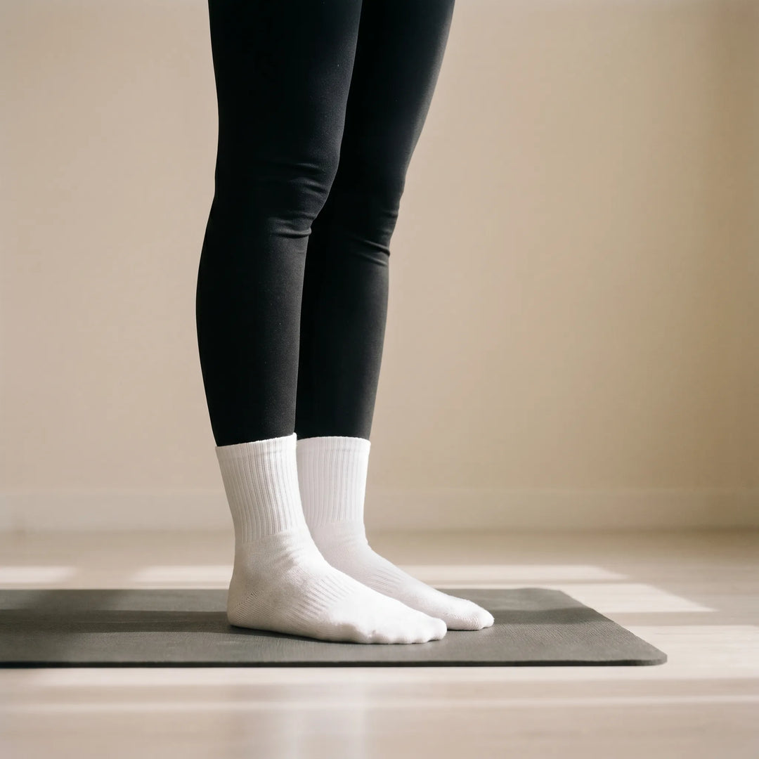 Women's grippy athletic crew socks for studio workouts, yoga, pilates & barre. Non-slip design.