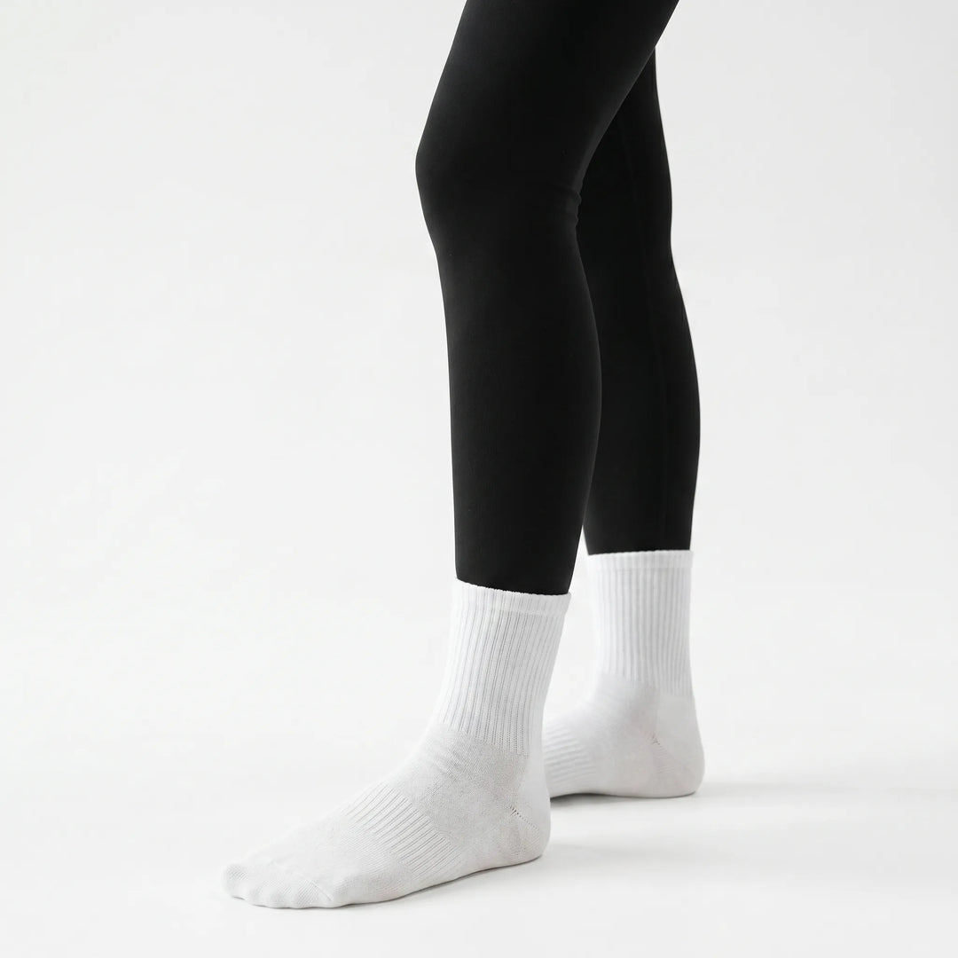 Lilac grippy crew socks for women's yoga, pilates & barre. Non-slip grip for secure studio workouts.