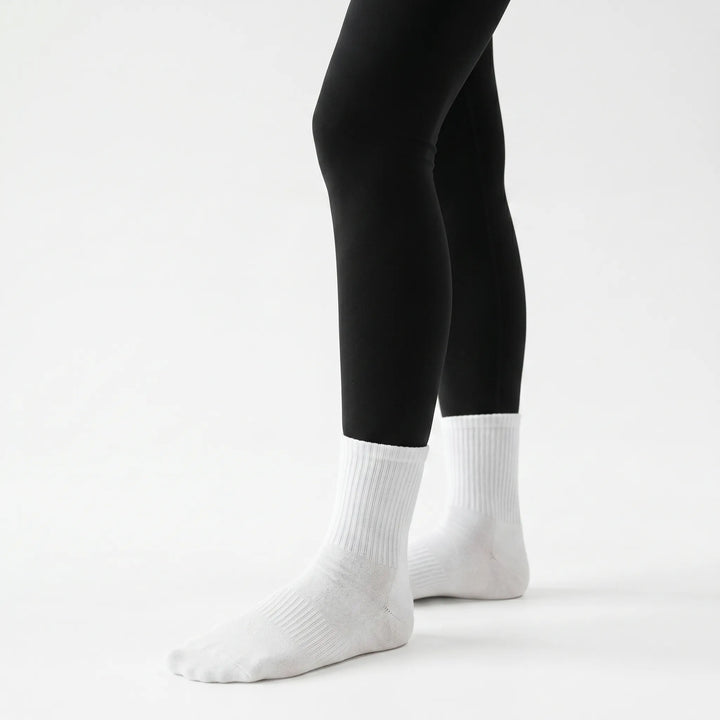 Lilac grippy crew socks for women's yoga, pilates & barre. Non-slip grip for secure studio workouts.