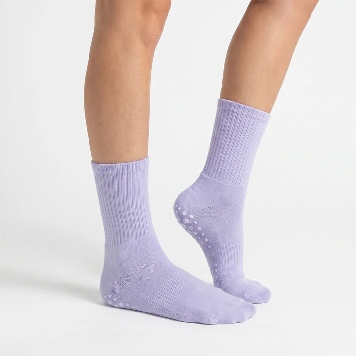 Perform better in studio workouts with women's grippy crew socks. Ideal for yoga, pilates & barre.