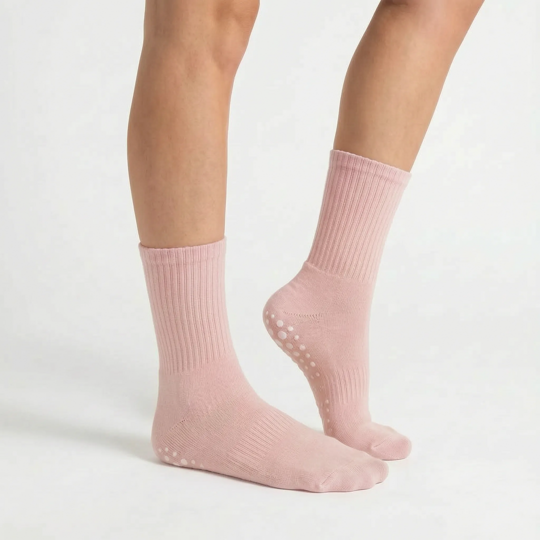 Women's fitness grippy crew socks for active studio workouts. Perfect for yoga, pilates, and barre.