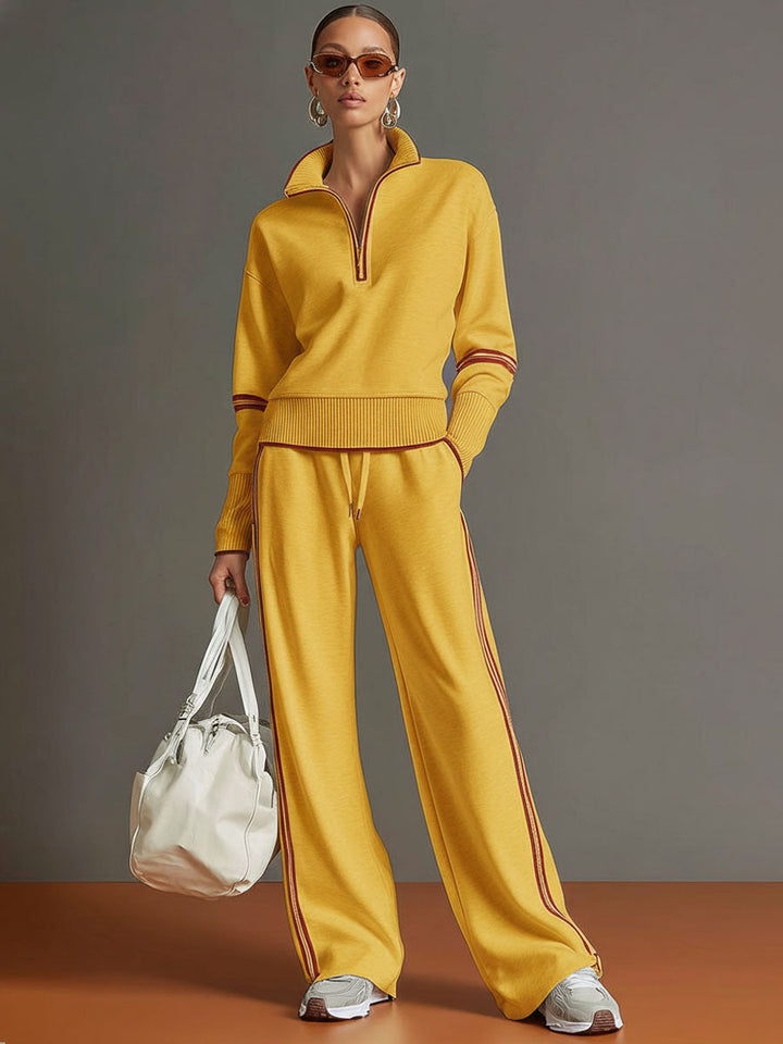 Women's two-piece casual outfit: a versatile half-zip sweatshirt and comfortable wide-leg pant set.