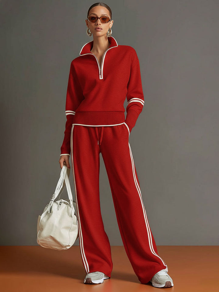 Side profile of a model wearing the women's half-zip sweatshirt and wide-leg pant co-ord set.