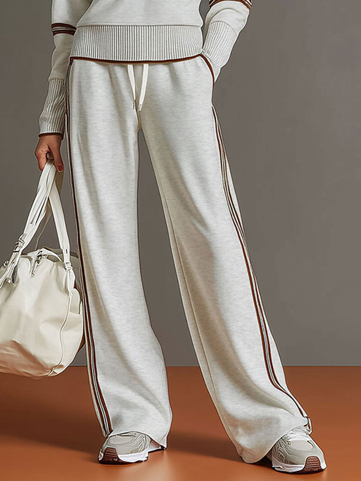 Detail of the flattering wide-leg cut on the comfortable women's pants from the stylish two-piece set.