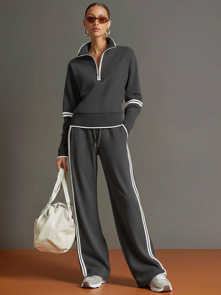 Full view of a women's half-zip sweatshirt and wide-leg pant set, designed for ultimate comfort & leisure.