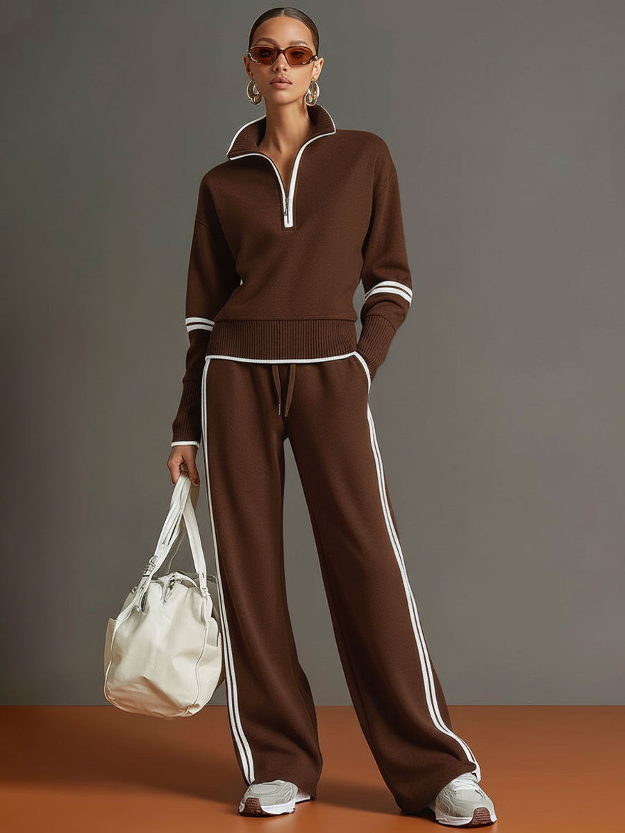 Close-up of the half-zip detail on the women's comfortable sweatshirt, part of a stylish matching set.