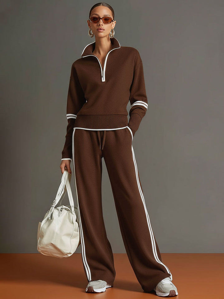 Close-up of the half-zip detail on the women's comfortable sweatshirt, part of a stylish matching set.