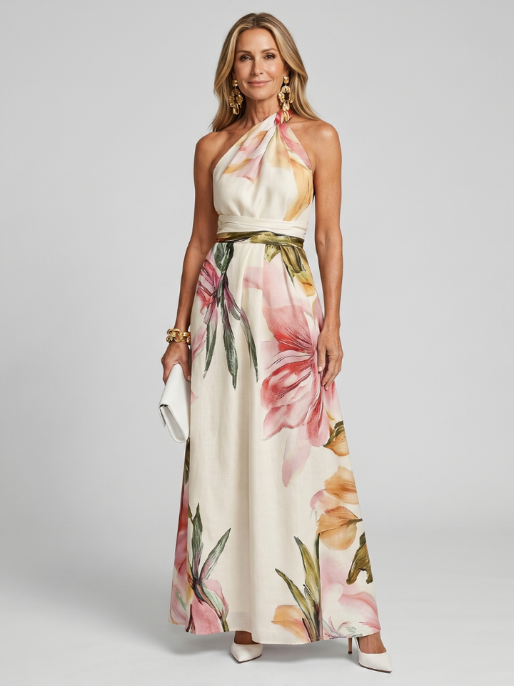 Women's halter maxi dress with a long, flowing skirt. Perfect for summer events & vacation.