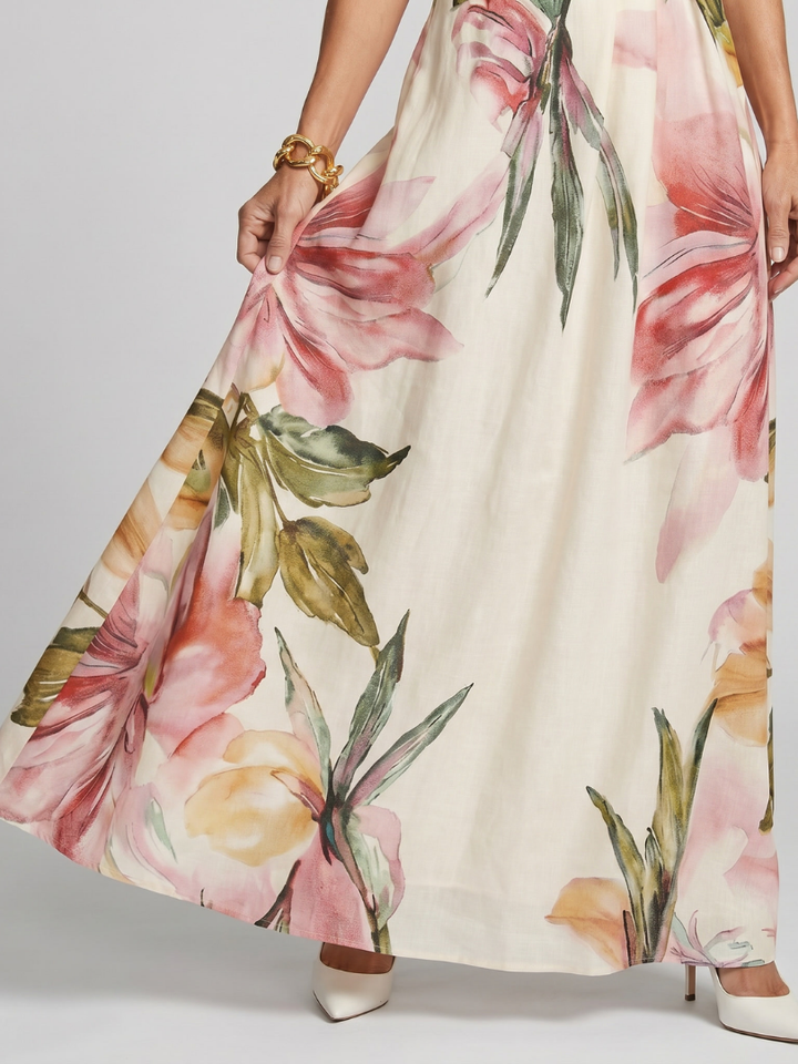 Elegant women's halter maxi dress for summer vacations & warm weather events. Features a flowing skirt.