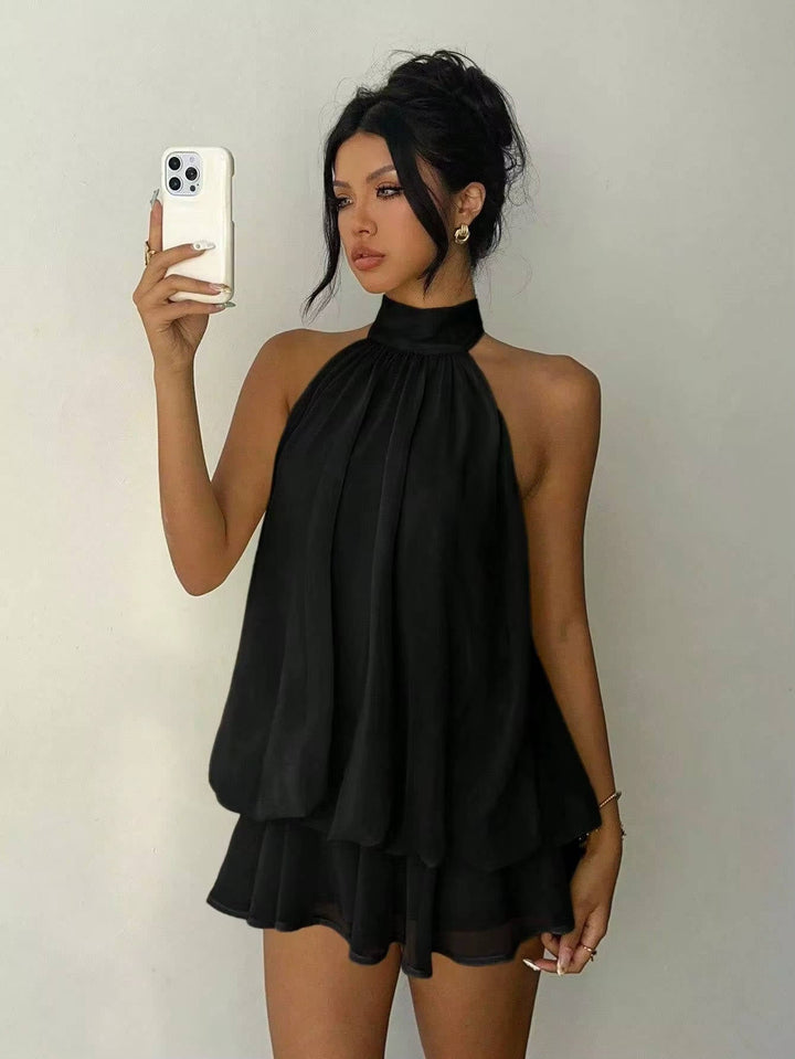 Stunning open back halter mini dress for women, features a chic ruffle hem, perfect for event wear.