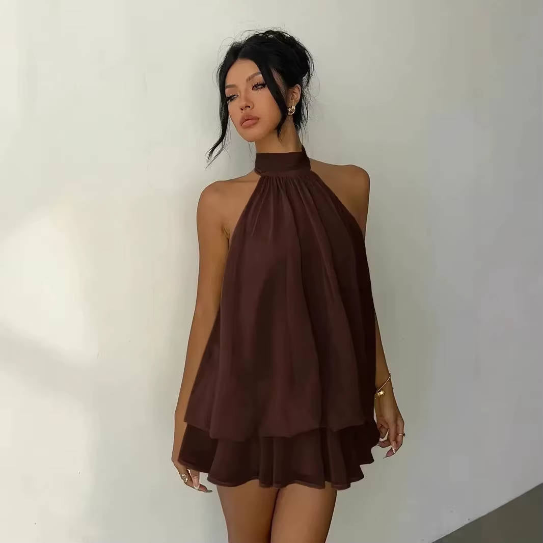 Chic women's halter cocktail mini dress, sleeveless, open back design with a delicate ruffle hem.