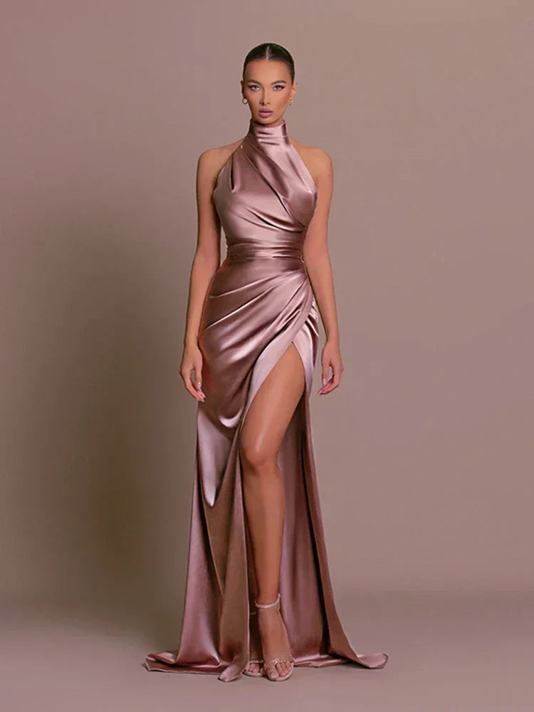 Women's halter neck ruched maxi dress, high split. Elegant formal evening gown for special occasions.