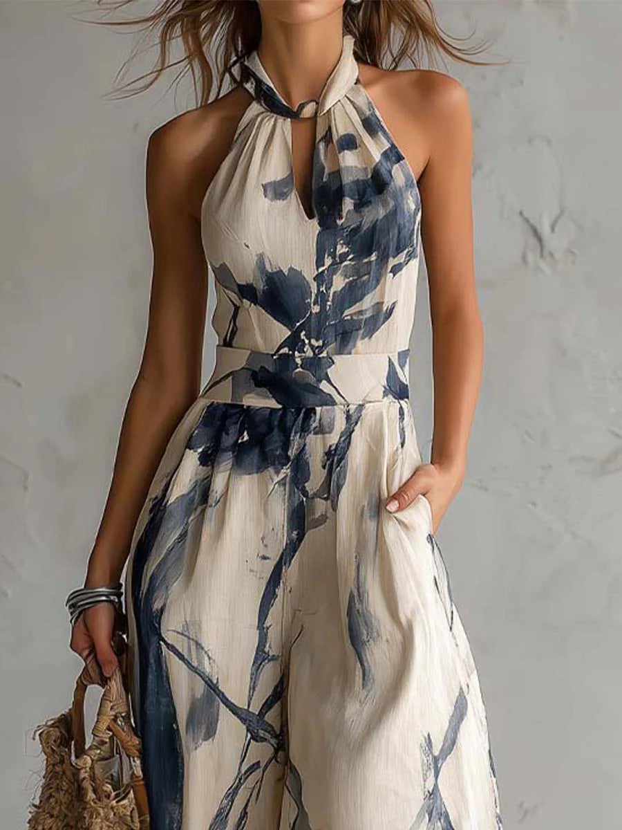 Elegant women's halter neck wide leg jumpsuit, comfortable & versatile for stylish casual wear or parties, with pockets.
