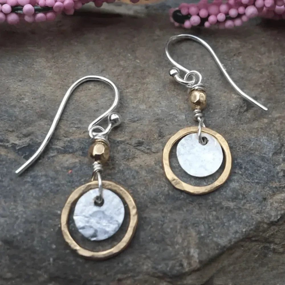 Women's hammered mixed metal drop earrings with gold & silver tones. Artisan dangle jewelry for a unique look.