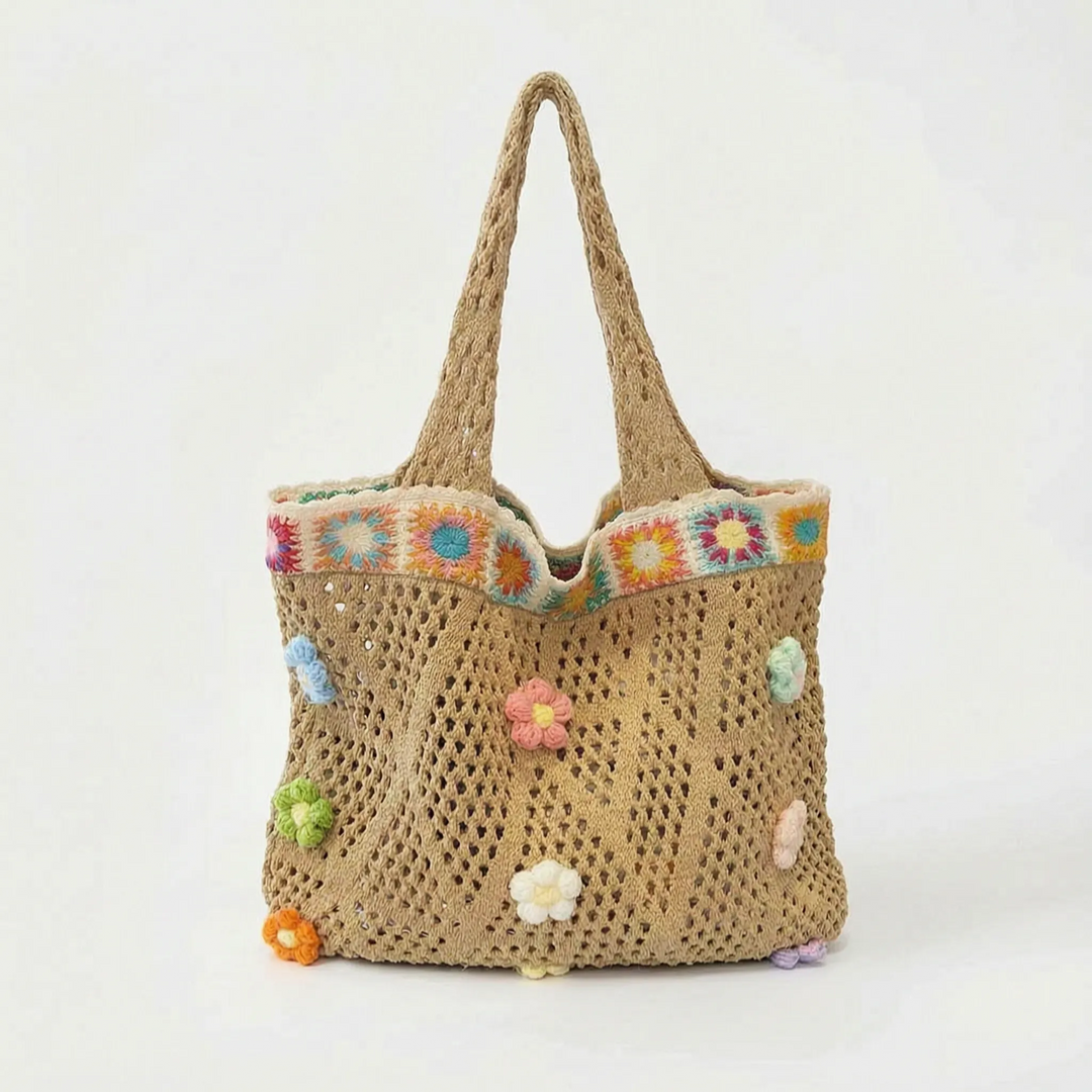 Stylish women's crochet flower tote bag, a versatile summer shoulder bag for beach, vacation, or casual use.