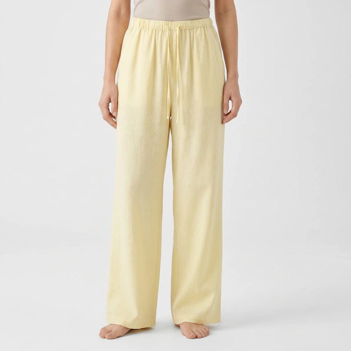 Solid color women's wide-leg summer pants with an adjustable waist for comfortable, relaxed fit travel.