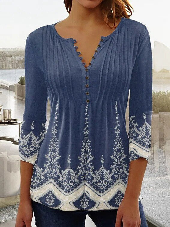 Stylish women's long sleeve Henley top with beautiful lace sleeves and button-down front.