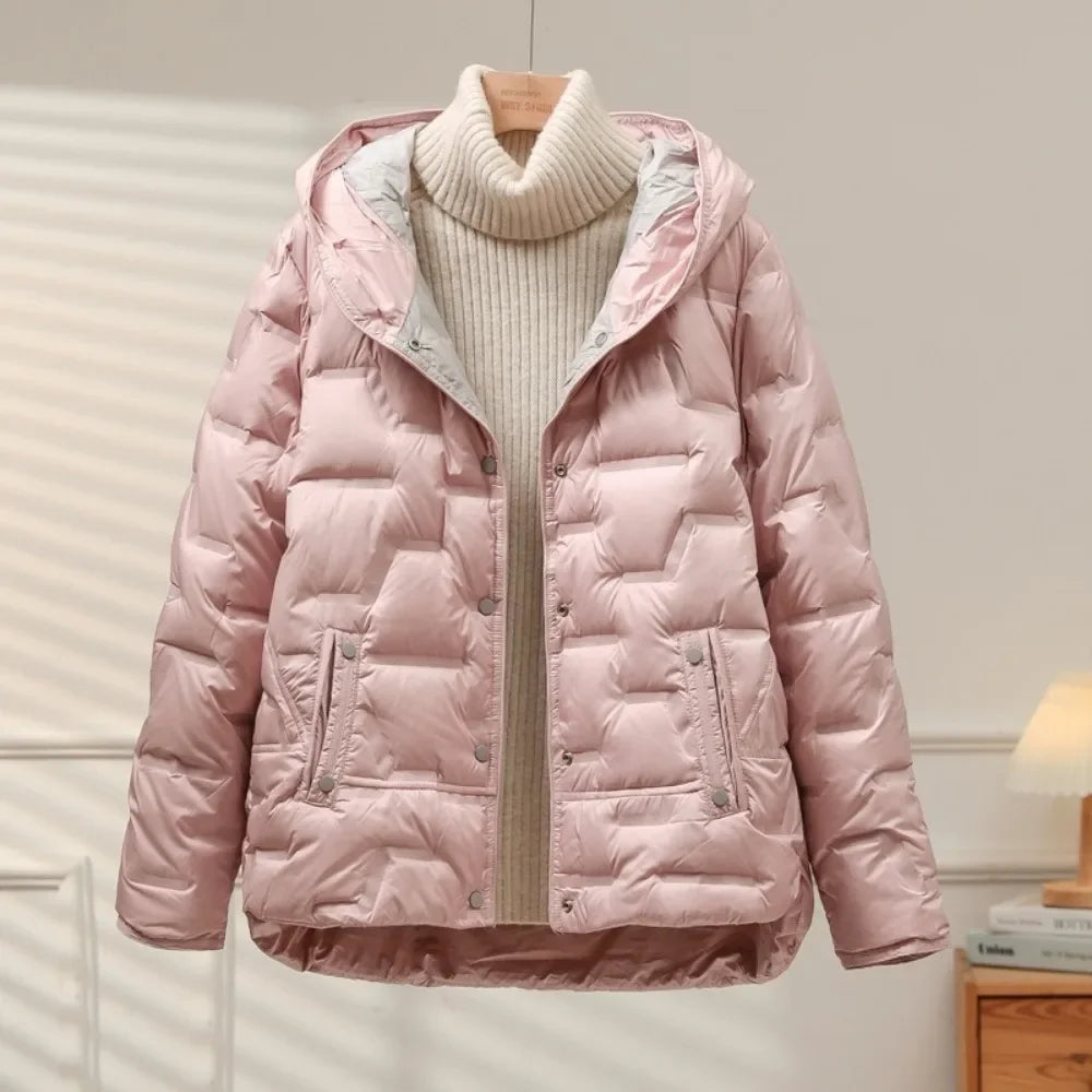 Classic women's heritage puffer jacket, a warm quilted outerwear piece with a durable snap closure for winter style.