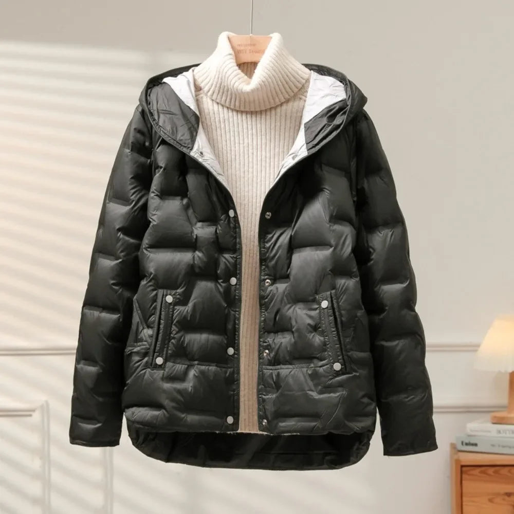 Warm women's heritage puffer jacket, a stylish quilted outerwear piece for winter, featuring easy snap closure and comfort.