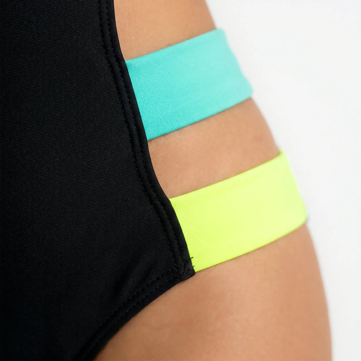 Stylish high-cut monokini swimsuit for women, showcasing modern cutouts and eye-catching neon trims.