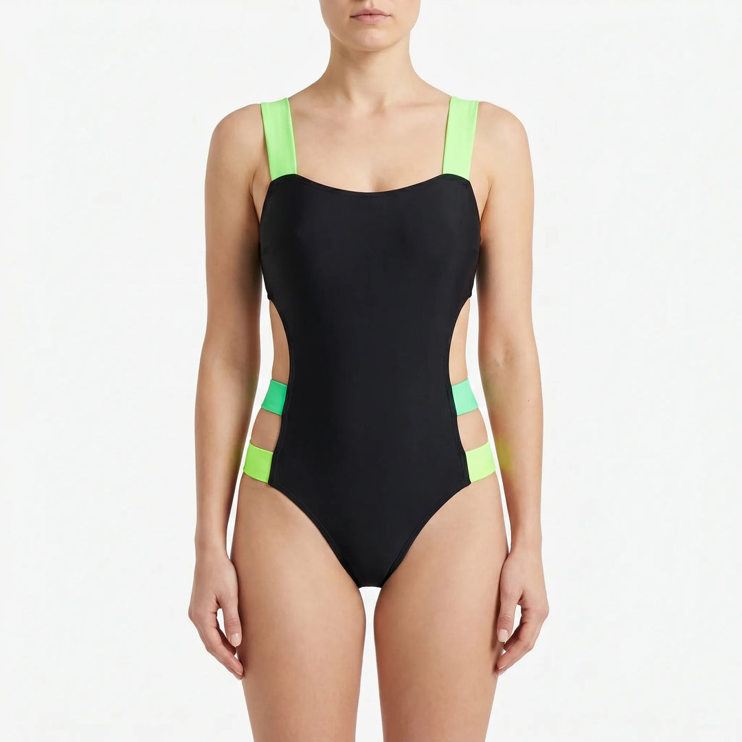 Fashion-forward women's cutout monokini, a bold one-piece design with bright neon details for vacation fashion.