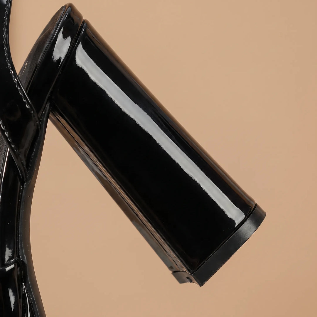 Comfortable women's chunky platform sandals with a high gloss finish, adjustable strap, and supportive block heel lift.
