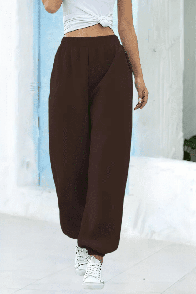 Trendy full-length women's joggers, soft touch, high-rise, perfect for everyday style & comfort.