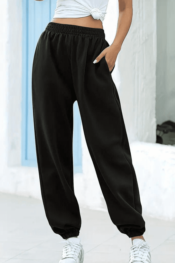 Versatile women's lounge pants, high-rise & relaxed fit, perfect for casual activities.