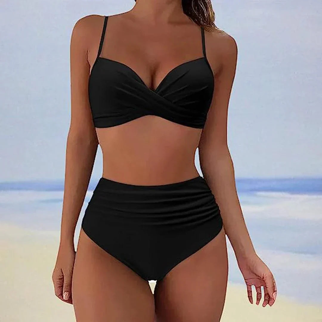 Stylish women's high-rise bikini swimsuit. Two-piece with adjustable straps for comfortable beach & pool summer wear.