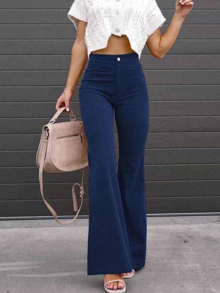Women's fashionable high waist flared trousers, featuring practical pockets and a comfortable, relaxed fit.