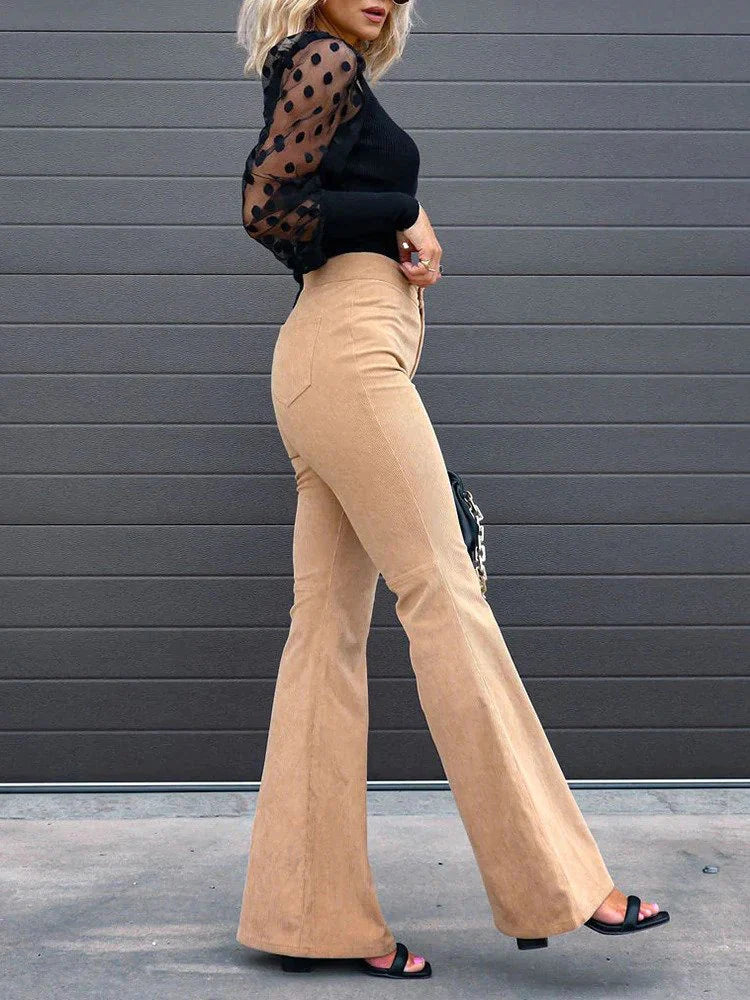 Modern women's high waist flare pants featuring functional side pockets and a flattering fit.