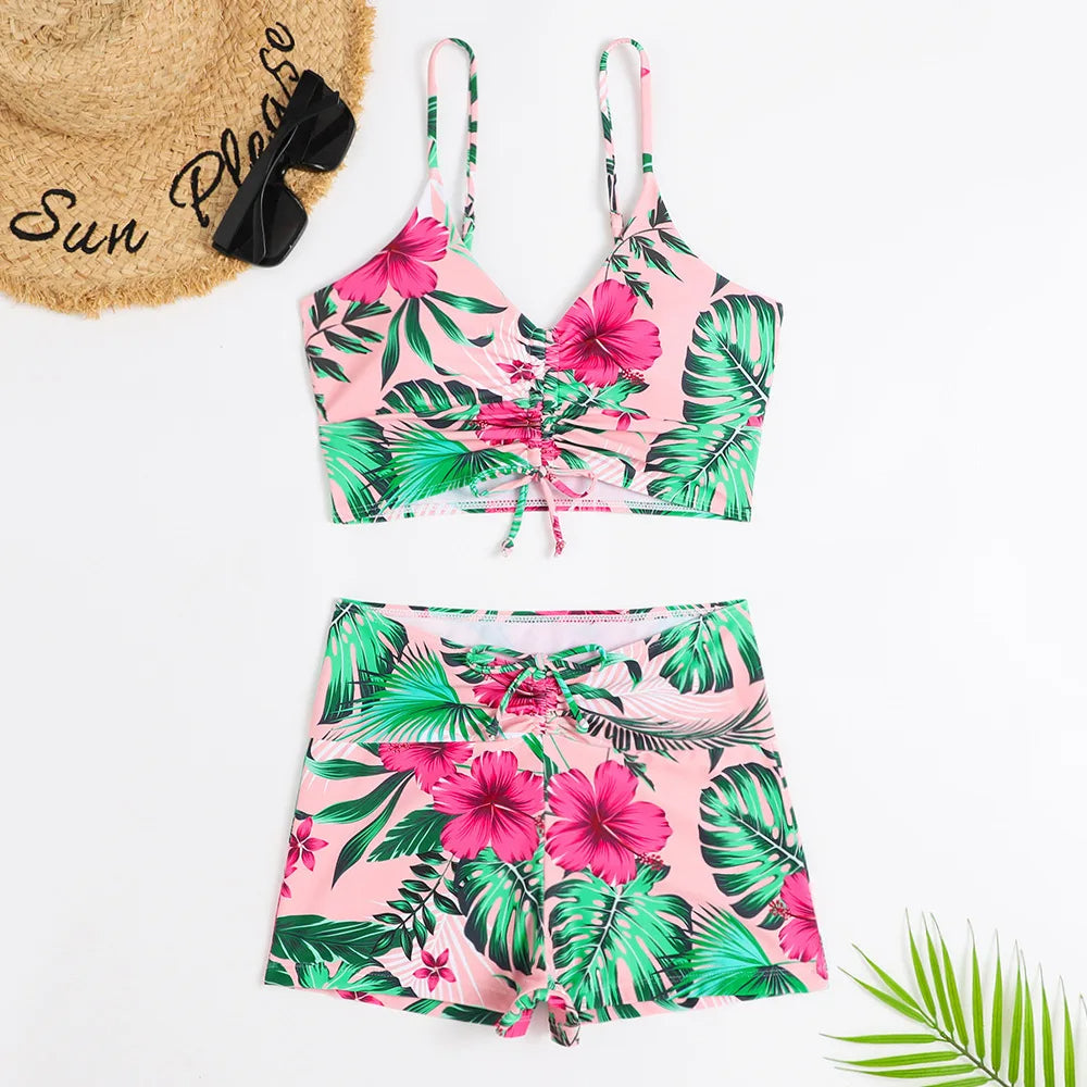 Elegant high-waist floral bikini set, supportive women's swimwear in a vintage beach style.