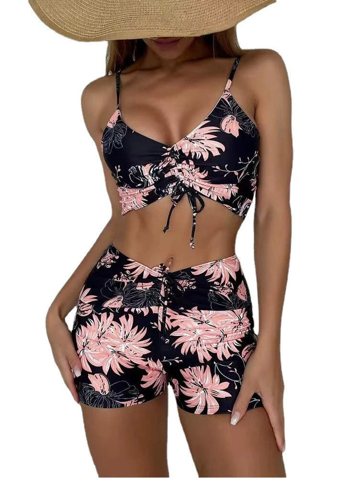 Flattering high-waist floral bikini set for women, supportive swimwear top, retro summer style.