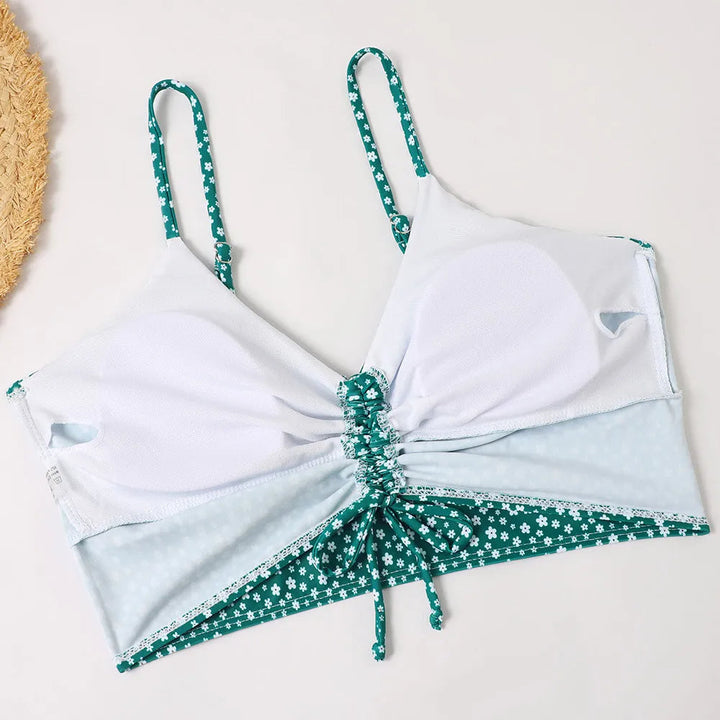 Women's high-waist floral bikini set, perfect summer swimwear for sunny beach days & poolside fun.