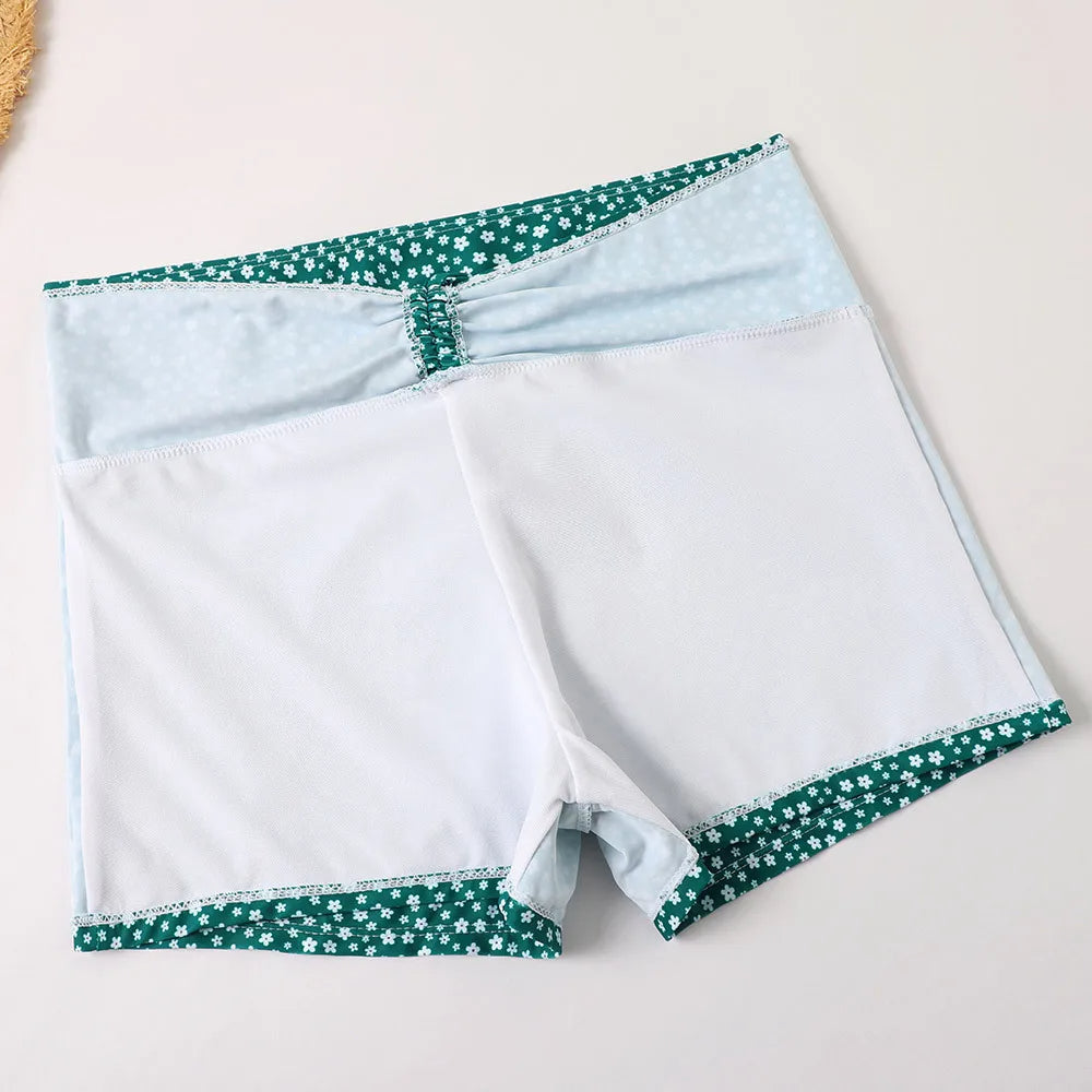 Two-piece high-waist floral bikini with supportive top & matching bottom, women's flattering swimwear.