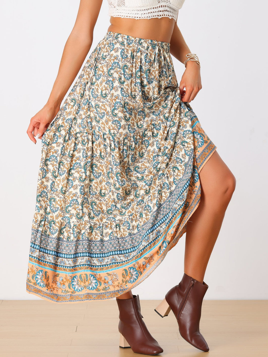 Women's high waist floral print maxi skirt with flowing side slit, perfect for summer vacation.