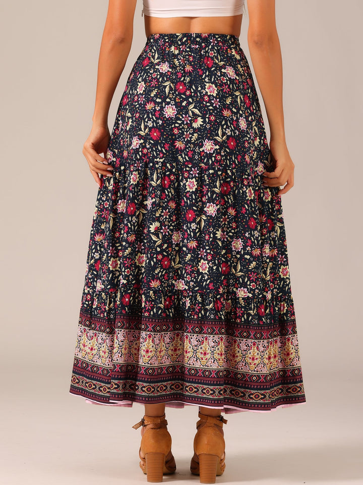 Women's high waist abstract print maxi skirt, long flowing design with a modern side slit.