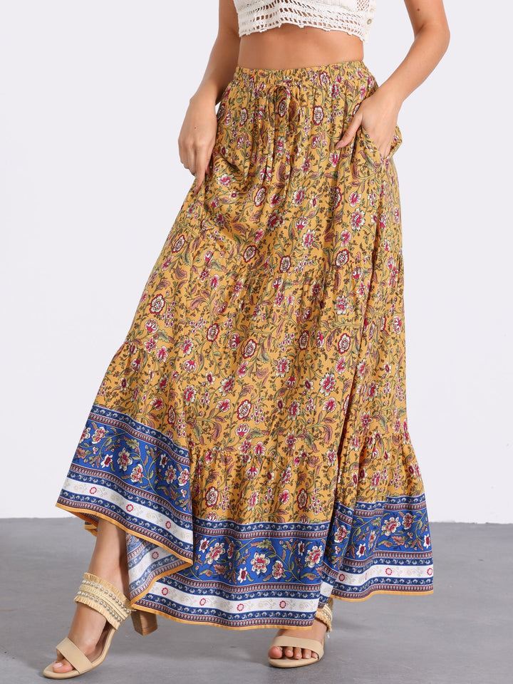 Women's printed maxi skirt, high waist, flowing bohemian style with a chic leg slit.