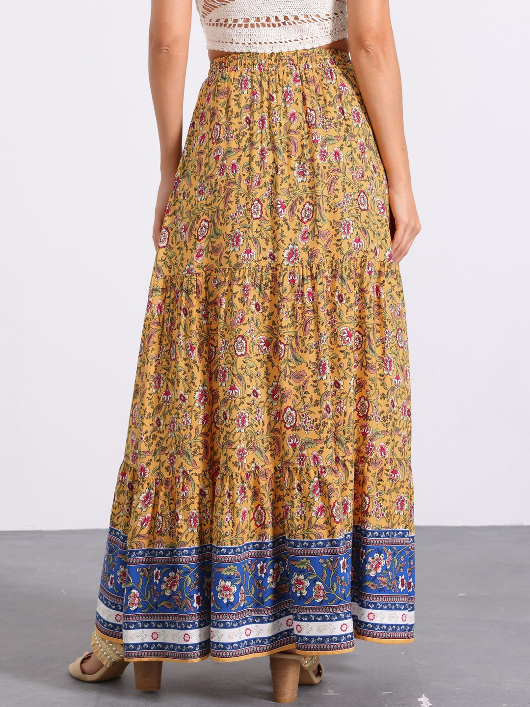 Summer-ready high waist maxi skirt for women, vibrant print and elegant flowing side slit.