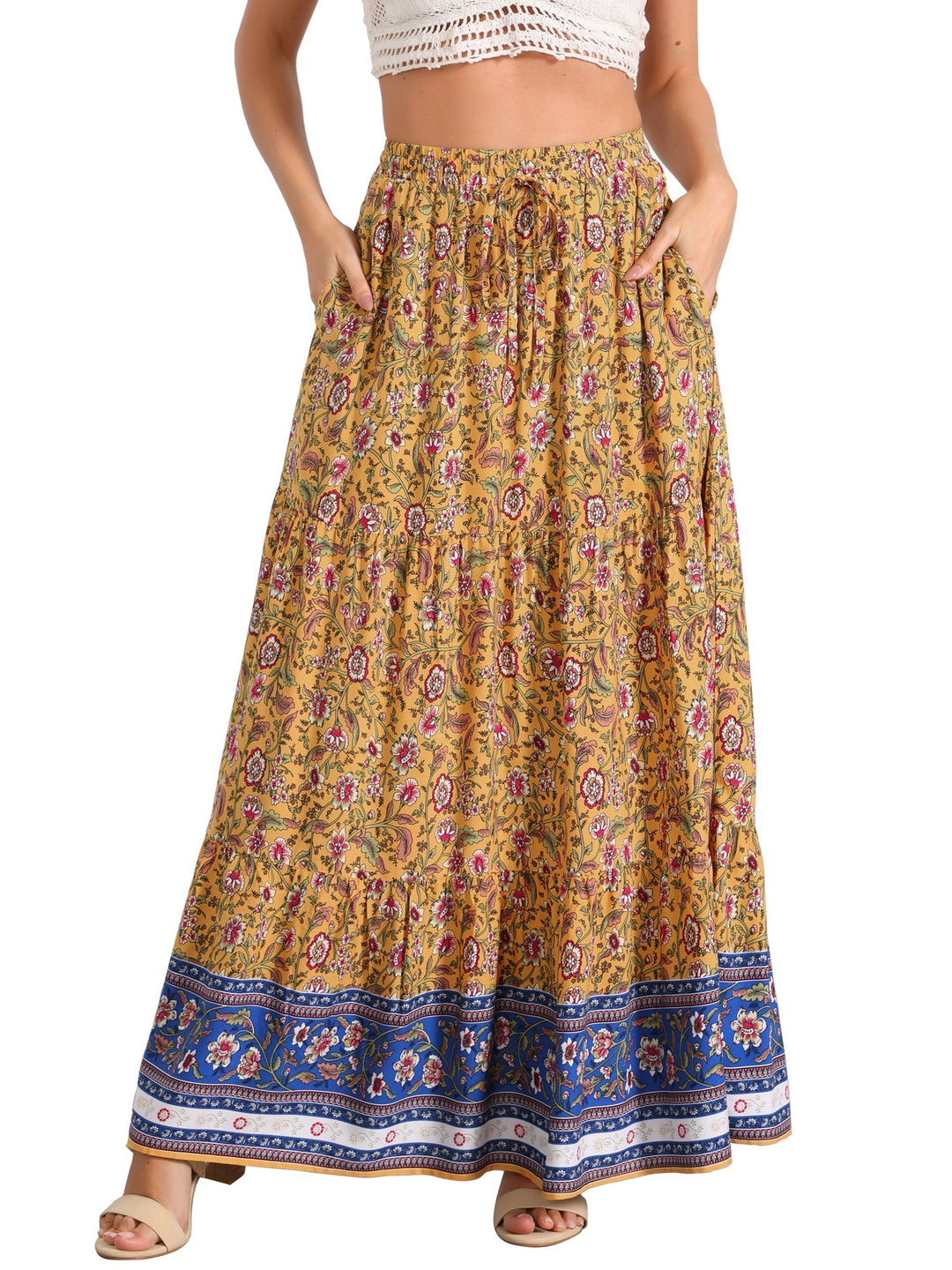High waist printed maxi skirt with a flowing side slit, offering casual chic for women.