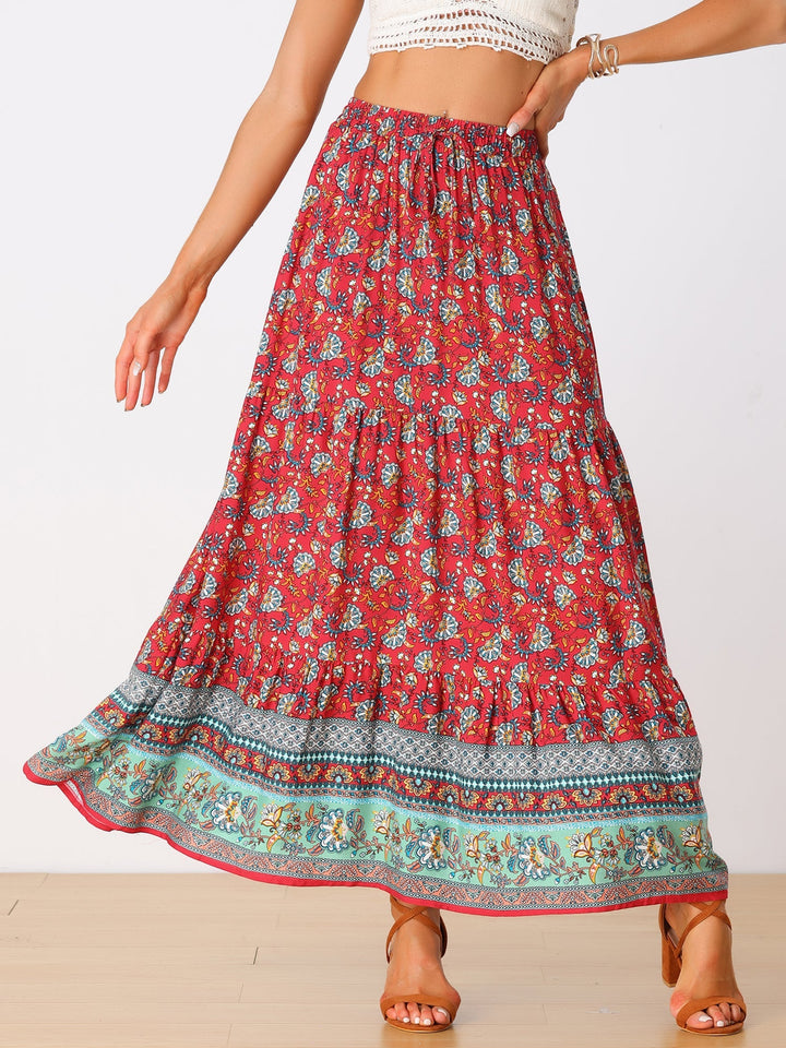 Printed high waist maxi skirt, flowing summer fashion piece for women with a side slit.