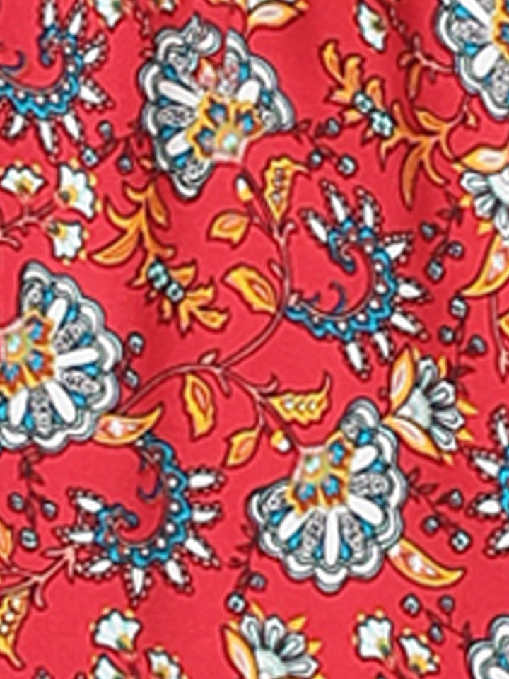 Flowing printed maxi skirt for women, high waist, side slit, ideal for summer evenings.