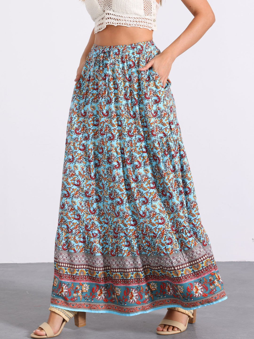 Women's high waist floral print maxi skirt with a flowing, comfortable side slit.