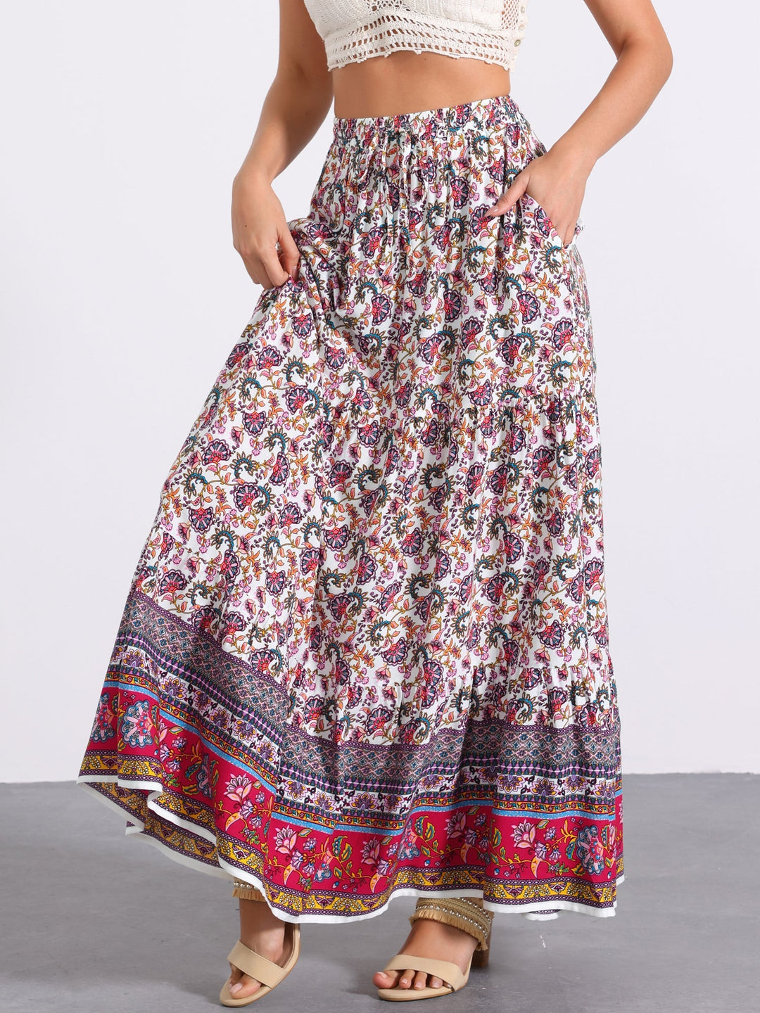 Women's high waist printed maxi skirt with a beautiful flowing drape & a side slit.