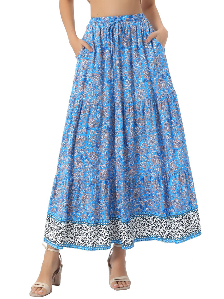 Women's vibrant print high waist maxi skirt, flowing, with a stylish side slit detail.
