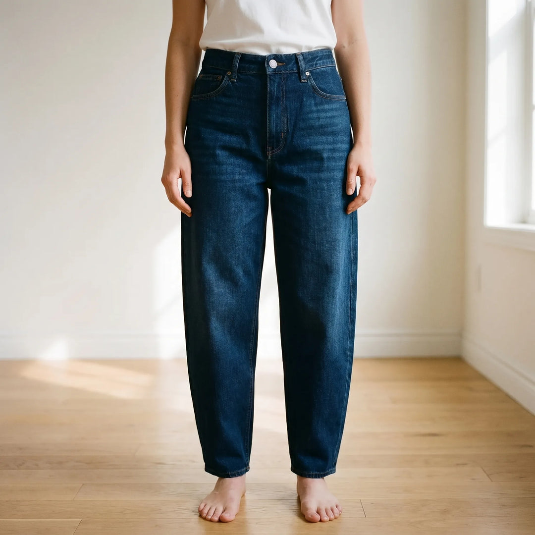 Women's high-waist relaxed barrel-leg blue jeans for effortless, comfortable everyday style.