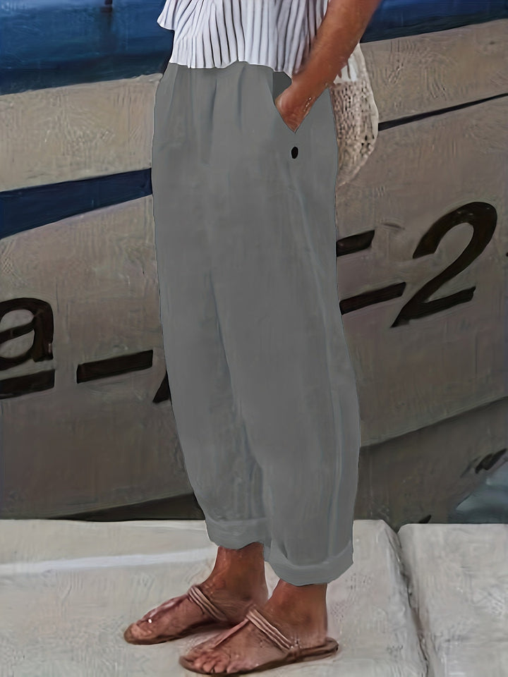 Versatile women's high waist relaxed pants with roll hem, ideal for summer holidays & casual everyday wear.